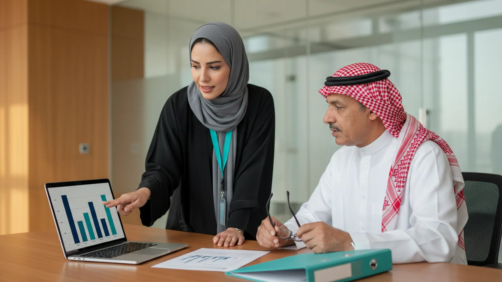 An accountant presents the monthly financial summary to a company owner